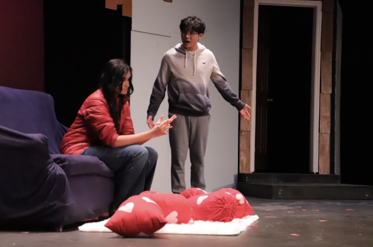 Dianhao Li (25), portraying Lendall in Green Hopes production, “Almost Maine,” acts out a breakup with fellow member of the drama club. Photo used with permission from Dianhao Li. 
